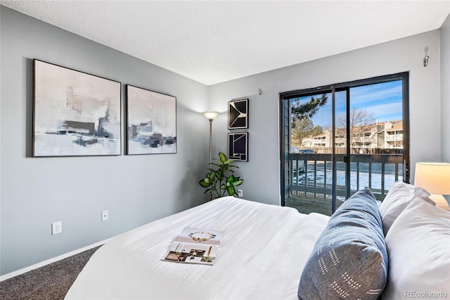 8600 E Alameda Ave Unit 13-108, Denver, CO 80247 - carpeted bedroom with access to outside and baseboards