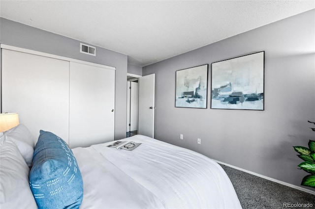 8600 E Alameda Ave Unit 13-108, Denver, CO 80247 - bedroom with carpet and a closet
