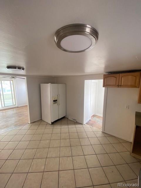 interior space featuring light tile patterned floors