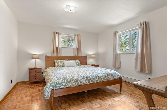 561 Quartz Cir, Bailey, CO 80421 - bedroom featuring baseboard heating and baseboards