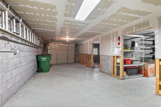 561 Quartz Cir, Bailey, CO 80421 - garage featuring concrete block wall