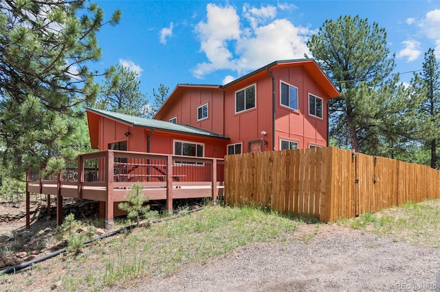 561 Quartz Cir, Bailey, CO 80421 - view of side of property featuring board and batten siding and a deck