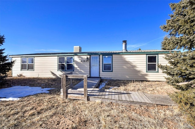 view of front of house with a deck