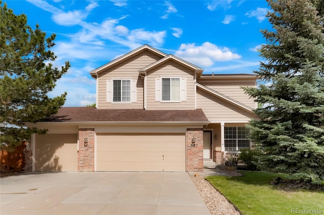 737 Novick Ct, Castle Rock, CO 80109 - traditional-style house featuring brick siding, concrete driveway, and an attached garage