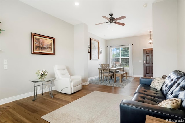 737 Novick Ct, Castle Rock, CO 80109 - living room featuring wood finished floors, a ceiling fan, and baseboards