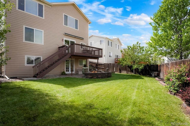 737 Novick Ct, Castle Rock, CO 80109 - back of house featuring stairs, a wooden deck, a fire pit, and a patio