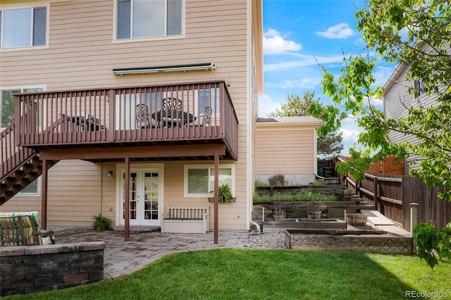 737 Novick Ct, Castle Rock, CO 80109 - rear view of property with a vegetable garden, a patio area, a deck, and stairs