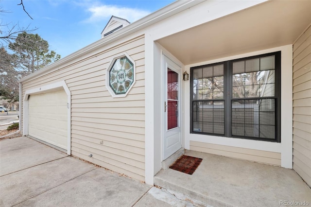 entrance to property featuring a garage