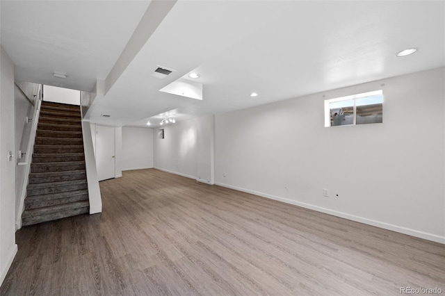 basement with light wood-type flooring