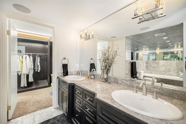 bathroom with tile patterned flooring and vanity