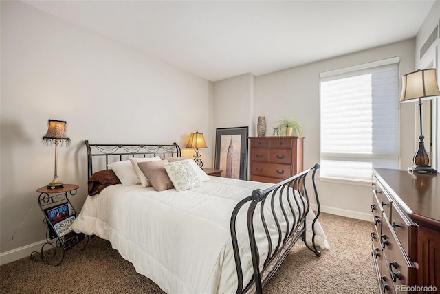 bedroom featuring light carpet