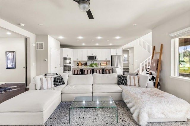 4778 Ravencrest Pl, Castle Rock, CO 80108 - living room with stairway, a ceiling fan, and recessed lighting