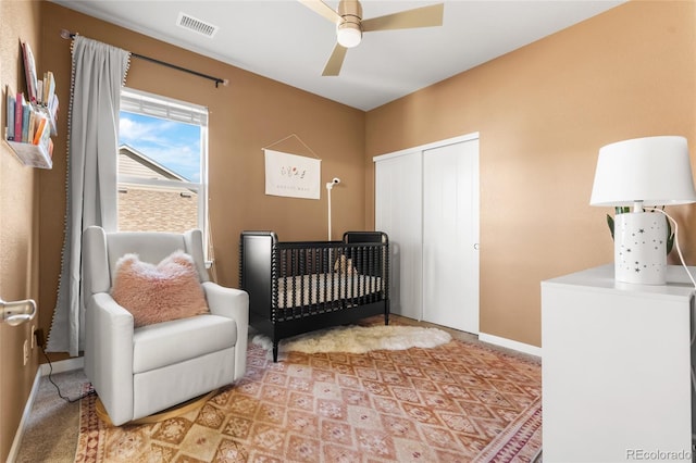 4778 Ravencrest Pl, Castle Rock, CO 80108 - bedroom featuring a closet, a ceiling fan, and a nursery area