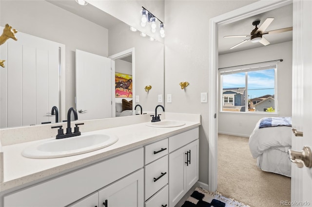 4778 Ravencrest Pl, Castle Rock, CO 80108 - ensuite bathroom featuring double vanity and baseboards
