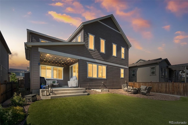 4778 Ravencrest Pl, Castle Rock, CO 80108 - back of house with a fenced backyard and a patio