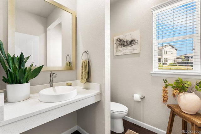 4778 Ravencrest Pl, Castle Rock, CO 80108 - bathroom with a sink and wood finished floors