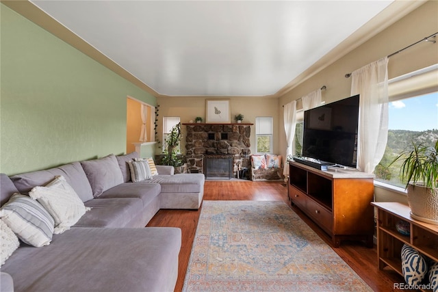 8701 Majestic View Dr, Conifer, CO 80433 - living area featuring wood finished floors and a fireplace