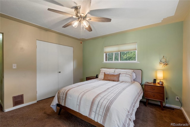 8701 Majestic View Dr, Conifer, CO 80433 - carpeted bedroom featuring a closet, baseboards, and ceiling fan