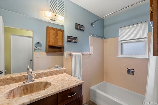 8701 Majestic View Dr, Conifer, CO 80433 - bathroom with tile walls, shower / tub combo with curtain, vanity, and wainscoting