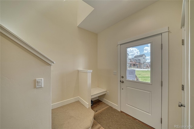 doorway featuring hardwood / wood-style floors