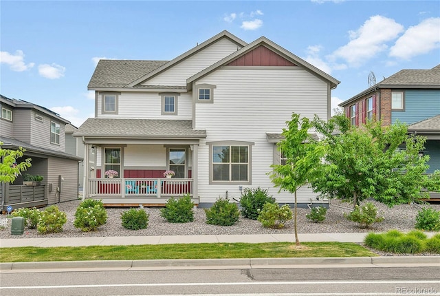 9307 Inca Dove Cir, Littleton, CO 80125 - view of front of house with a porch and a shingled roof