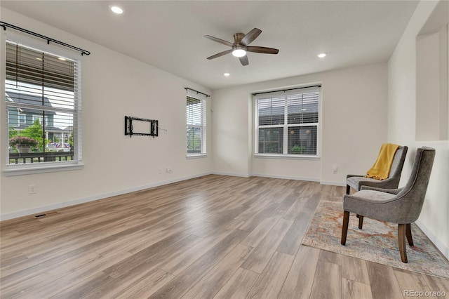 9307 Inca Dove Cir, Littleton, CO 80125 - unfurnished room with wood finished floors, a ceiling fan, and recessed lighting