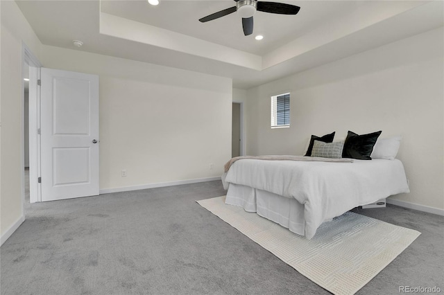 9307 Inca Dove Cir, Littleton, CO 80125 - bedroom with carpet, a raised ceiling, recessed lighting, and ceiling fan