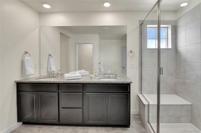9307 Inca Dove Cir, Littleton, CO 80125 - full bathroom featuring a shower stall and double vanity