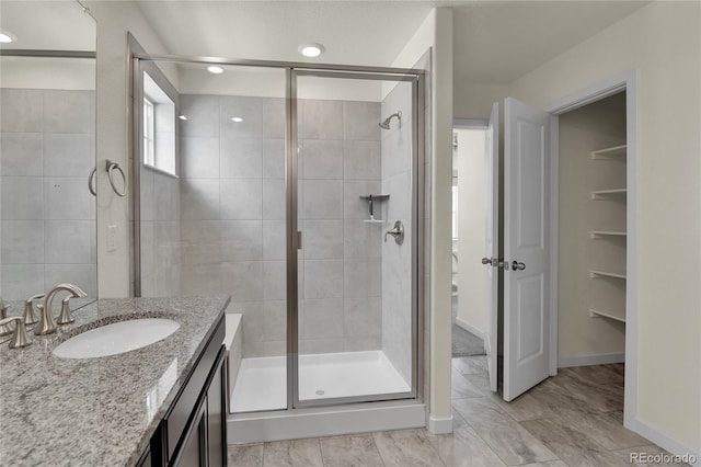 9307 Inca Dove Cir, Littleton, CO 80125 - bathroom with a stall shower and vanity