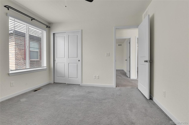 9307 Inca Dove Cir, Littleton, CO 80125 - unfurnished bedroom featuring carpet and a closet