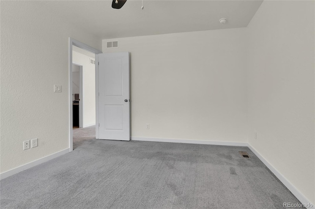 9307 Inca Dove Cir, Littleton, CO 80125 - carpeted spare room featuring a ceiling fan and a smoke detector