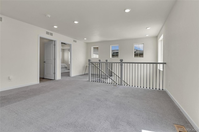 9307 Inca Dove Cir, Littleton, CO 80125 - empty room featuring carpet, recessed lighting, and a smoke detector