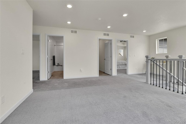 9307 Inca Dove Cir, Littleton, CO 80125 - empty room with light colored carpet and recessed lighting