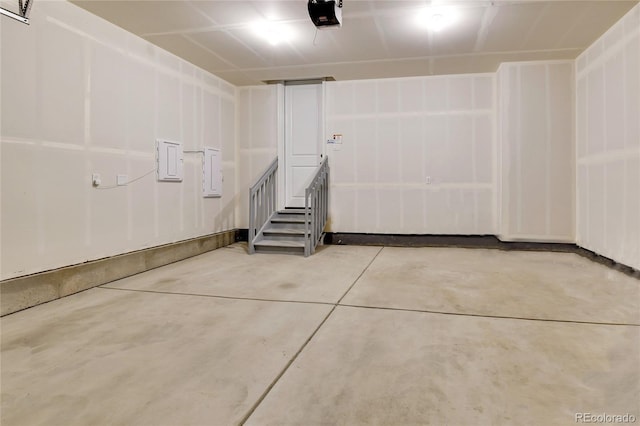 9307 Inca Dove Cir, Littleton, CO 80125 - garage with a garage door opener and electric panel