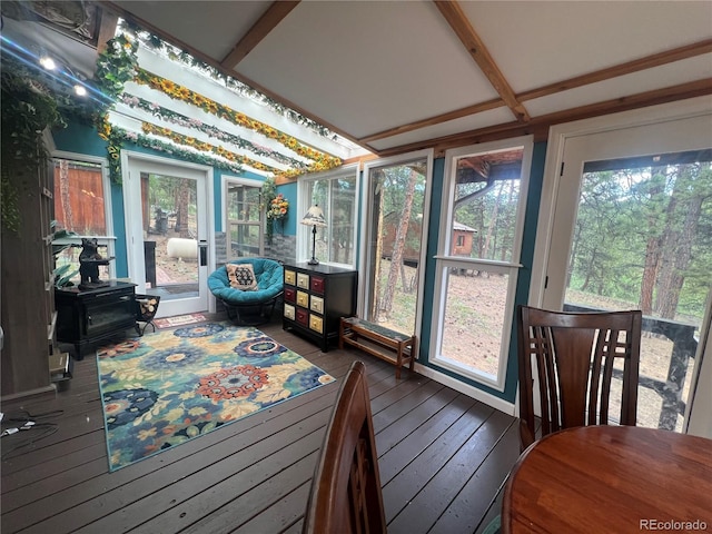 187 Johnson Rd, Bailey, CO 80421 - sunroom with plenty of natural light, wood-type flooring, a wooden deck, and beamed ceiling