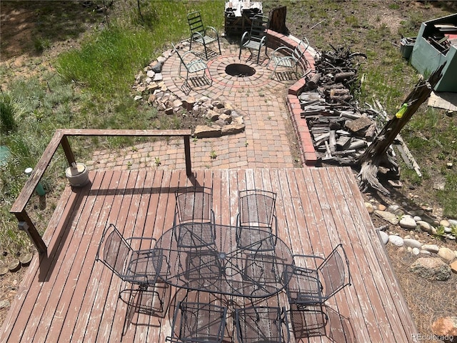 187 Johnson Rd, Bailey, CO 80421 - wooden terrace featuring an outdoor fire pit and a patio area
