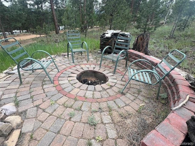 187 Johnson Rd, Bailey, CO 80421 - view of patio / terrace with a fire pit