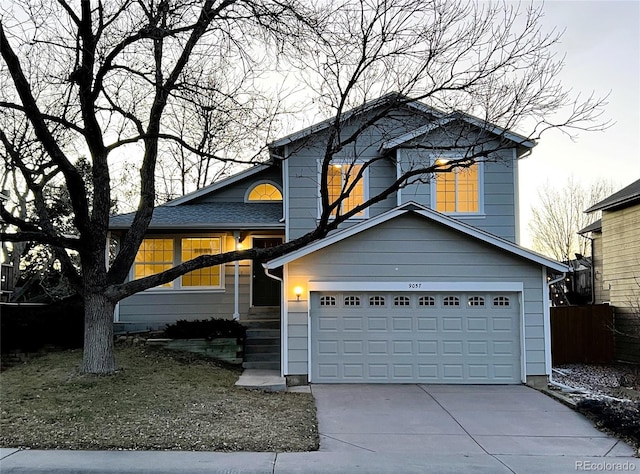 view of front of property featuring a garage