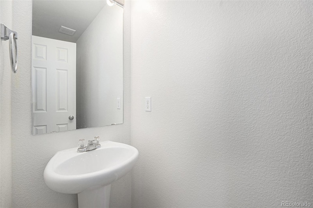 5550 Malta St, Denver, CO 80249 - bathroom featuring a sink