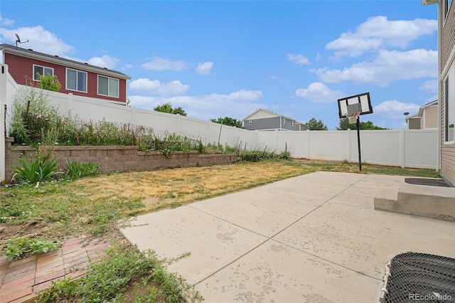 5550 Malta St, Denver, CO 80249 - fenced backyard featuring a patio area