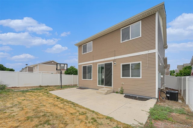 5550 Malta St, Denver, CO 80249 - rear view of property with a fenced backyard and a patio area