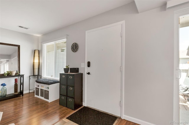 8751 Chase Dr Unit 181, Arvada, CO 80003 - foyer entrance with wood finished floors and baseboards