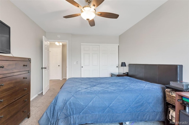 8751 Chase Dr Unit 181, Arvada, CO 80003 - bedroom featuring light carpet, a closet, and ceiling fan