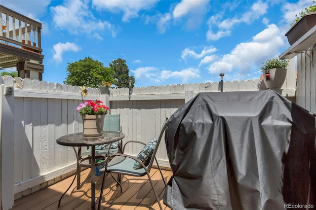 8751 Chase Dr Unit 181, Arvada, CO 80003 - wooden deck with a grill