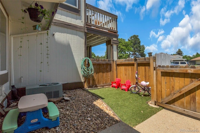 8751 Chase Dr Unit 181, Arvada, CO 80003 - view of yard featuring a balcony and a gate