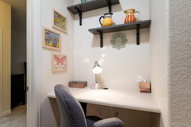 8520 S Holland Ln Unit 102, Littleton, CO 80128 - office area featuring built in desk and carpet flooring