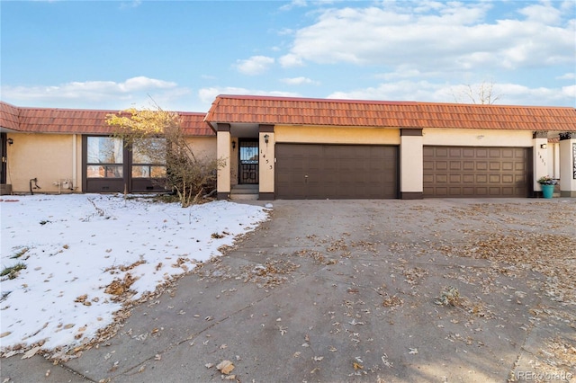 view of front of property with a garage