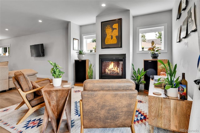 3178 N Race St, Denver, CO 80205 - living room with a glass covered fireplace, recessed lighting, and wood finished floors
