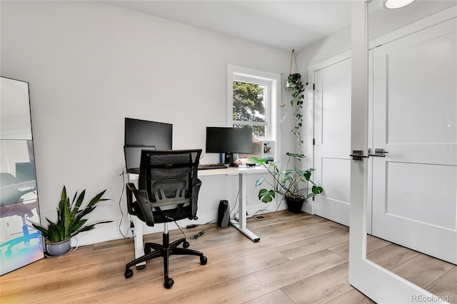 3178 N Race St, Denver, CO 80205 - office area featuring light wood-style flooring