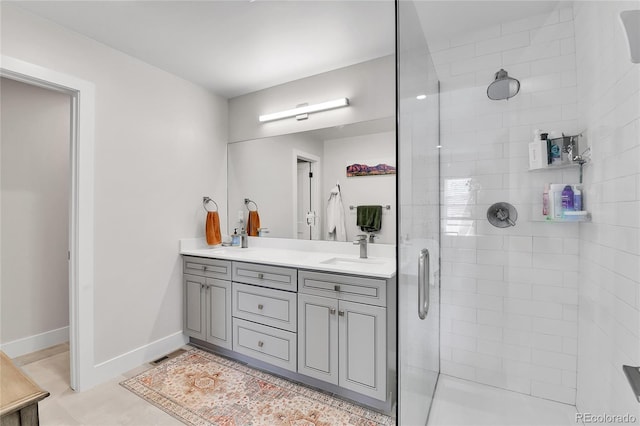 3178 N Race St, Denver, CO 80205 - full bathroom featuring double vanity, tiled shower, baseboards, and tile patterned floors